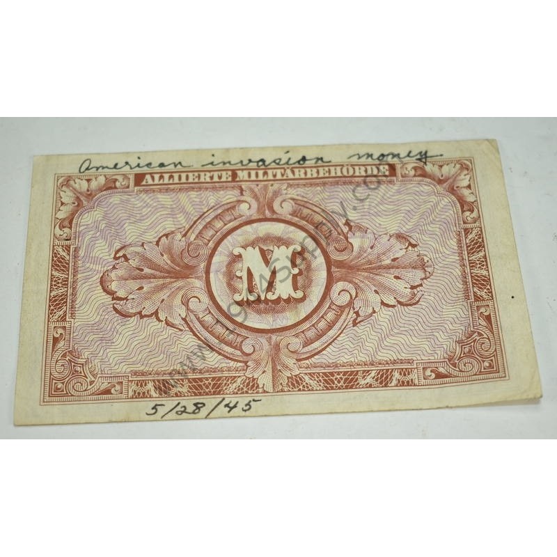 Monnaie de 10 mark avec note écrite