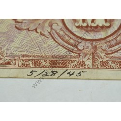 10 Mark currency with written note