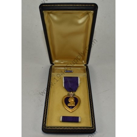 Purple Heart medal set in coffin case