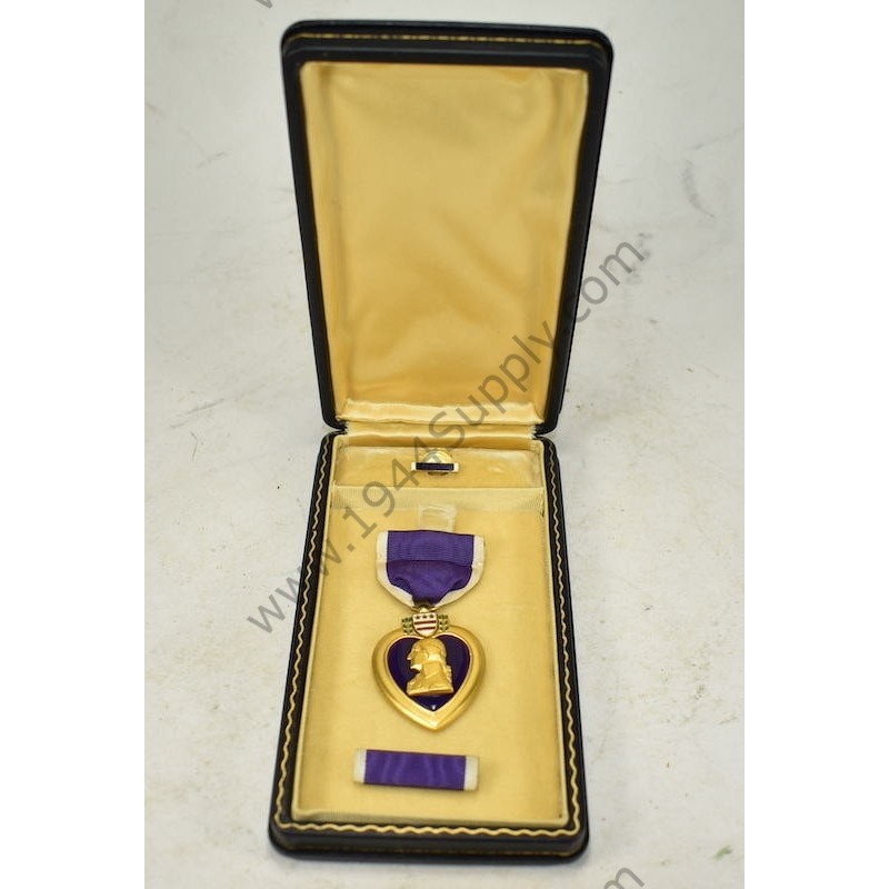 Purple Heart medal set in coffin case