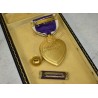 Purple Heart medal set in coffin case