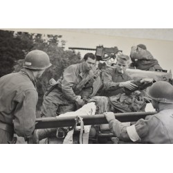 Photo of wounded GI being transported