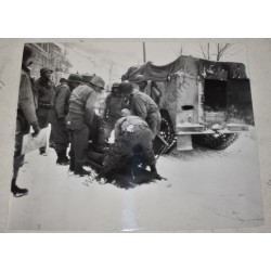 Photo of wounded GI on a stretcher, Belgium