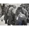 Photo of wounded GI on a stretcher, Belgium