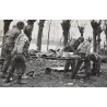 Photo of medics carrying casualty