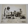 Photo of two nurses at a Bren gun