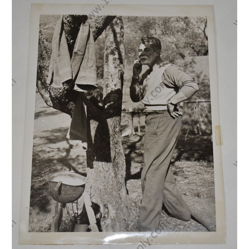 Photo of correspondent using helmet as washing basin