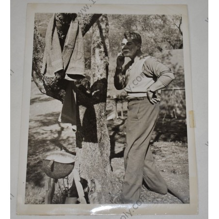 Photo of correspondent using helmet as washing basin