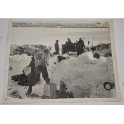 Photo of GI's washing up in the snow
