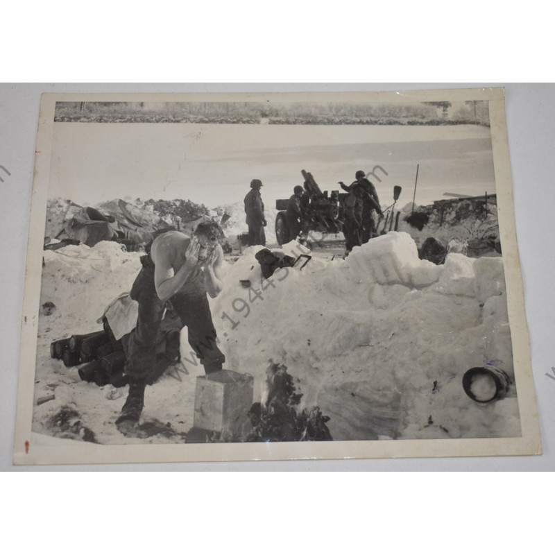 Photo of GI's washing up in the snow