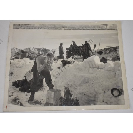 Photo of GI's washing up in the snow