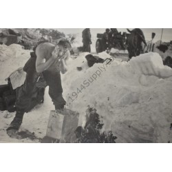 Photo of GI's washing up in the snow