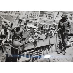 Photo of General Patton stepping ashore in Sicily