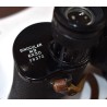 Binoculars in leather case