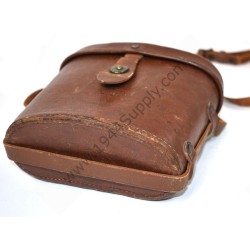 Binoculars in leather case