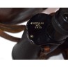 Binoculars in leather case