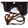 Binoculars in leather case