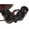 Binoculars in leather case