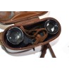 Binoculars in leather case