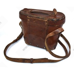 Binoculars in leather case