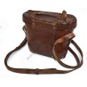 Binoculars in leather case