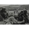 Photo of GI's firing 61mm mortar