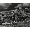 Photo of 7th Division GI's firing 75mm Howitzer