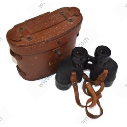 Jumelles dans étui en cuir