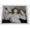 Photo of John Doolittle carrying machinegun